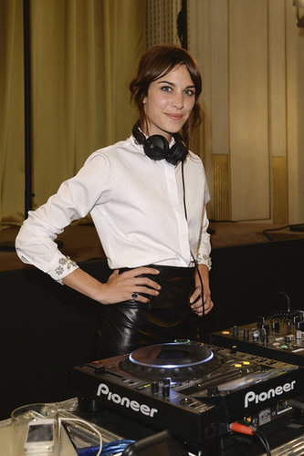 Alexa Chung spun tunes in a leather skirt as stylish partygoers listened in.
Alexa Chung spun tunes in a leather skirt as stylish partygoers listened in.