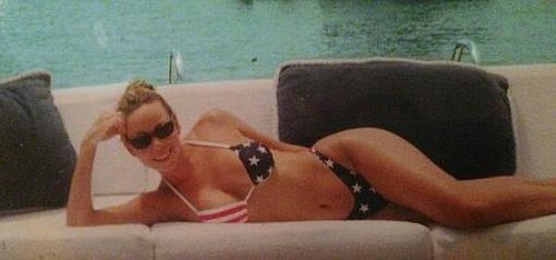 Mariah Carey posed in an American-flag-print bikini.
Source: Twitter user MariahCarey
Mariah Carey posed in an American-flag-print bikini.
Source: Twitter user MariahCarey