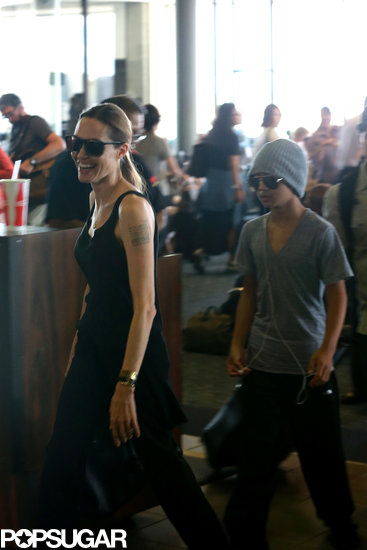 Angelina Jolie smiled as she touched down in Hawaii with Maddox Jolie-Pitt.
Angelina Jolie smiled as she touched down in Hawaii with Maddox Jolie-Pitt.