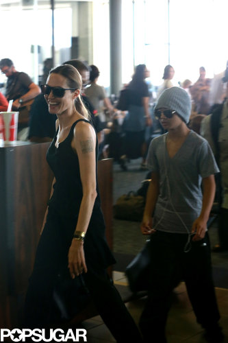 Angelina Jolie smiled as she touched down in Hawaii with Maddox Jolie-Pitt.
Angelina Jolie smiled as she touched down in Hawaii with Maddox Jolie-Pitt.
