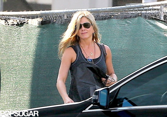 Jennifer Aniston wore aviator sunglasses.
Jennifer Aniston wore aviator sunglasses.