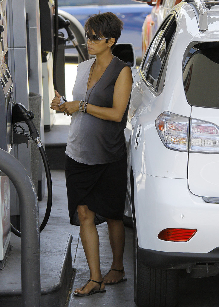 A little gas station run didn't stop Halle from looking ultrafashionable in an ombré tank and high-low skirt. Beaded bracelets added much-needed shine.
A little gas station run didn't stop Halle from looking ultrafashionable in an ombré tank and high-low skirt. Beaded bracelets added much-needed shine.