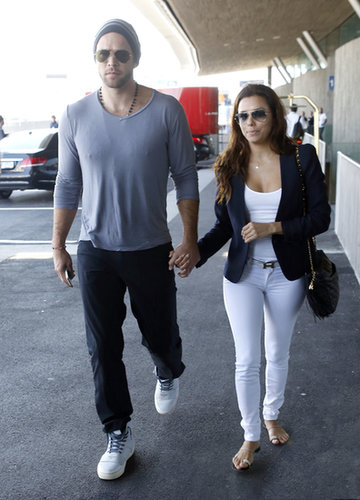 Eva Longoria's white look got a polished and preppy finish from her blue blazer and classic black bag.
Eva Longoria's white look got a polished and preppy finish from her blue blazer and classic black bag.
