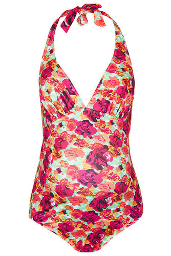 The Summer rose print on Topshop's halter swimsuit ($64) is altogether flirty and fun.
The Summer rose print on Topshop's halter swimsuit ($64) is altogether flirty and fun.
