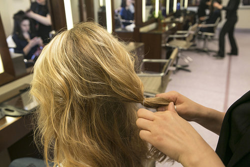 After you've teased your hair, part in the center and smooth back the middle section of hair at the crown into a loose half ponytail that's secured around the nape of the neck.
After you've teased your hair, part in the center and smooth back the middle section of hair at the crown into a loose half ponytail that's secured around the nape of the neck.