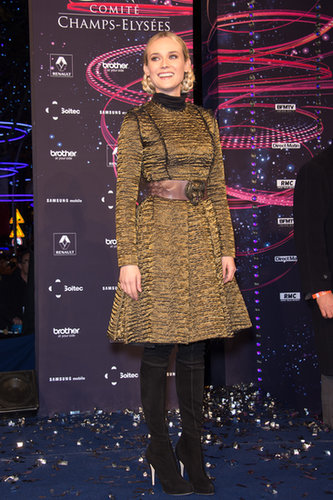 Kruger wore a brocade, metallic coatdress and leather tiger belt, both by Lanvin, with over-the-knee boots for a November 2012 event in Paris.
Kruger wore a brocade, metallic coatdress and leather tiger belt, both by Lanvin, with over-the-knee boots for a November 2012 event in Paris.