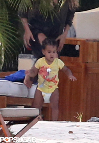 Blue Carter walked around the pool.
Blue Carter walked around the pool.