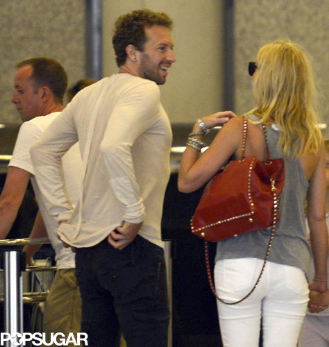 Gwyneth Paltrow and Chris Martin chatted at the airport in Spain.
Gwyneth Paltrow and Chris Martin chatted at the airport in Spain.