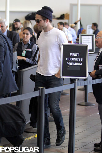 Robert Pattinson made his way through security.
Robert Pattinson made his way through security.