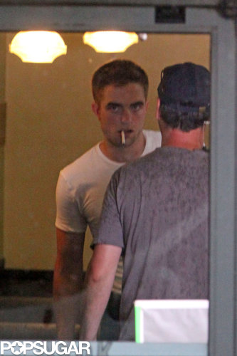 Robert Pattinson was too hot to handle while on set in Toronto on Friday.
Robert Pattinson was too hot to handle while on set in Toronto on Friday.