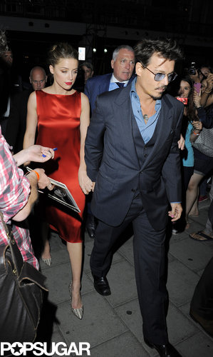 Johnny Depp and Amber Heard Show Love in London Following His UK Premiere Johnny Depp and Amber Heard Show Love in London Following His UK Premiere