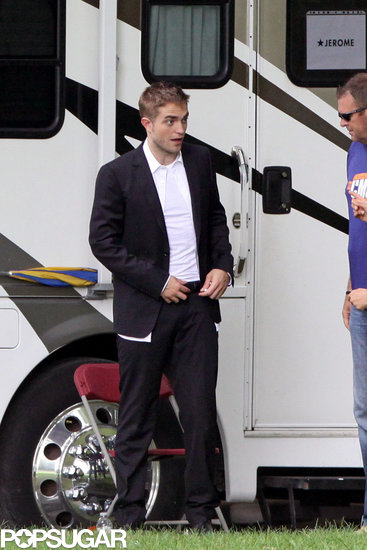 Robert Pattinson wore a suit jacket and pants on set in Toronto.
Robert Pattinson wore a suit jacket and pants on set in Toronto.