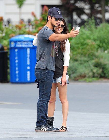 Taylor Lautner took a photo of himself with new girlfriend Marie Avgeropoulos in NYC in July 2013.
Taylor Lautner took a photo of himself with new girlfriend Marie Avgeropoulos in NYC in July 2013.