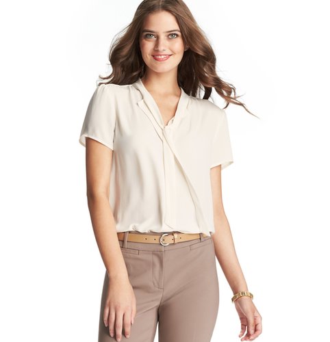 Loft's silky smooth tie-neck top ($45) adds a polished finish to all your trousers and skirts.
Loft's silky smooth tie-neck top ($45) adds a polished finish to all your trousers and skirts.