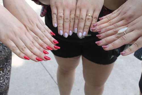 Even an outdoor music festival calls for a fresh manicure. Isabel went with a classic red shade, while her friends opted for more muted hues.
Even an outdoor music festival calls for a fresh manicure. Isabel went with a classic red shade, while her friends opted for more muted hues.