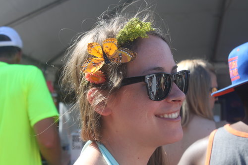 We have to give Laura credit: her butterfly headband was an original look among so many floral hair accessories around the grounds.
We have to give Laura credit: her butterfly headband was an original look among so many floral hair accessories around the grounds.
