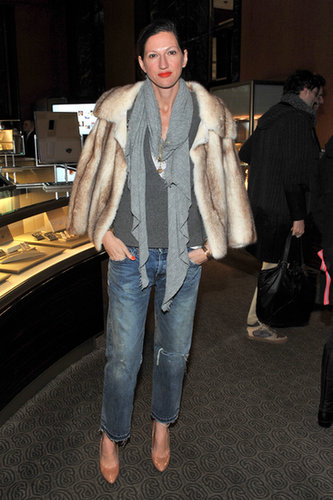 Again, her baggy jeans get capped off with a touch of luxury thanks to a fur jacket.
Again, her baggy jeans get capped off with a touch of luxury thanks to a fur jacket.