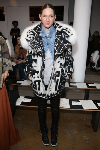 Our favorite part of this fashion week look? The way she's thrown a denim jacket, buttoned just at the top, into this layered mix.
Our favorite part of this fashion week look? The way she's thrown a denim jacket, buttoned just at the top, into this layered mix.