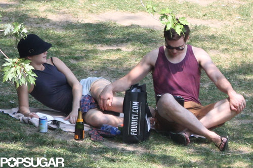 Nicholas Hoult rested his hand on Jennifer Lawrence's leg at the park.
Nicholas Hoult rested his hand on Jennifer Lawrence's leg at the park.
