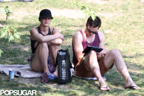 Jennifer Lawrence relaxed in the shade while Nicholas Hoult read.
Jennifer Lawrence relaxed in the shade while Nicholas Hoult read.