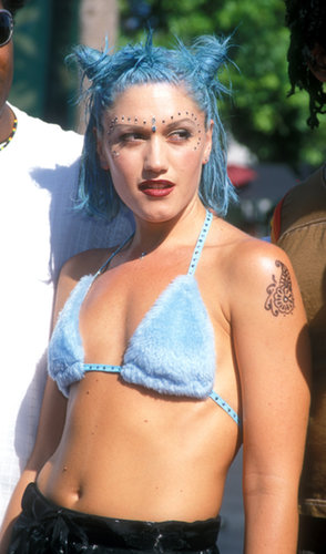 At the 1998 VMAs, Gwen Stefani donned cotton candy-colored hair and gemstones dotted along her eyes. It was a look very different from her current signature blond locks and red lipstick.
At the 1998 VMAs, Gwen Stefani donned cotton candy-colored hair and gemstones dotted along her eyes. It was a look very different from her current signature blond locks and red lipstick.