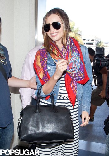 Miranda Kerr Looks Chic to Hit the Runway at LAX Miranda Kerr Looks Chic to Hit the Runway at LAX