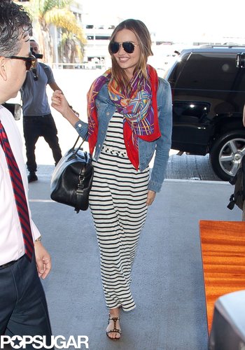 Miranda Kerr wore a scarf and denim jacket as she caught a flight out of LAX.
Miranda Kerr wore a scarf and denim jacket as she caught a flight out of LAX.