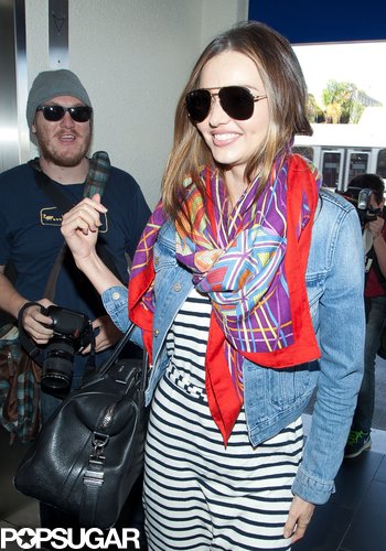 Miranda Kerr Looks Chic to Hit the Runway at LAX Miranda Kerr Looks Chic to Hit the Runway at LAX