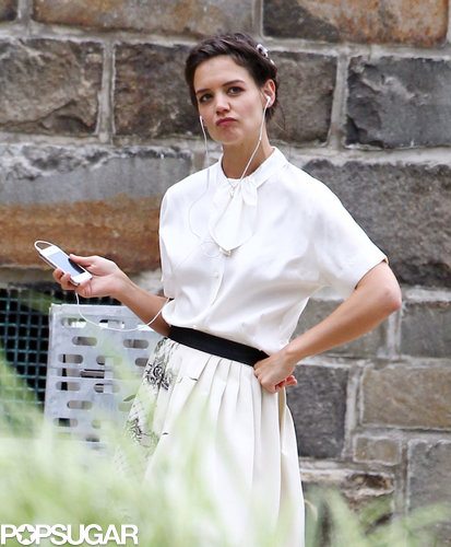 Katie Holmes struck a sassy pose while listening to music on set.
Katie Holmes struck a sassy pose while listening to music on set.
