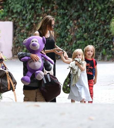 Angelina Jolie held her twins' hands as the group walked through Santa Barbara.
Angelina Jolie held her twins' hands as the group walked through Santa Barbara.