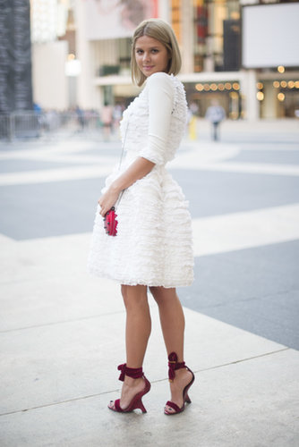 Only the best for Lincoln Center — this showgoer slipped into a frilly white dress and bow-tied heels.
Only the best for Lincoln Center — this showgoer slipped into a frilly white dress and bow-tied heels.