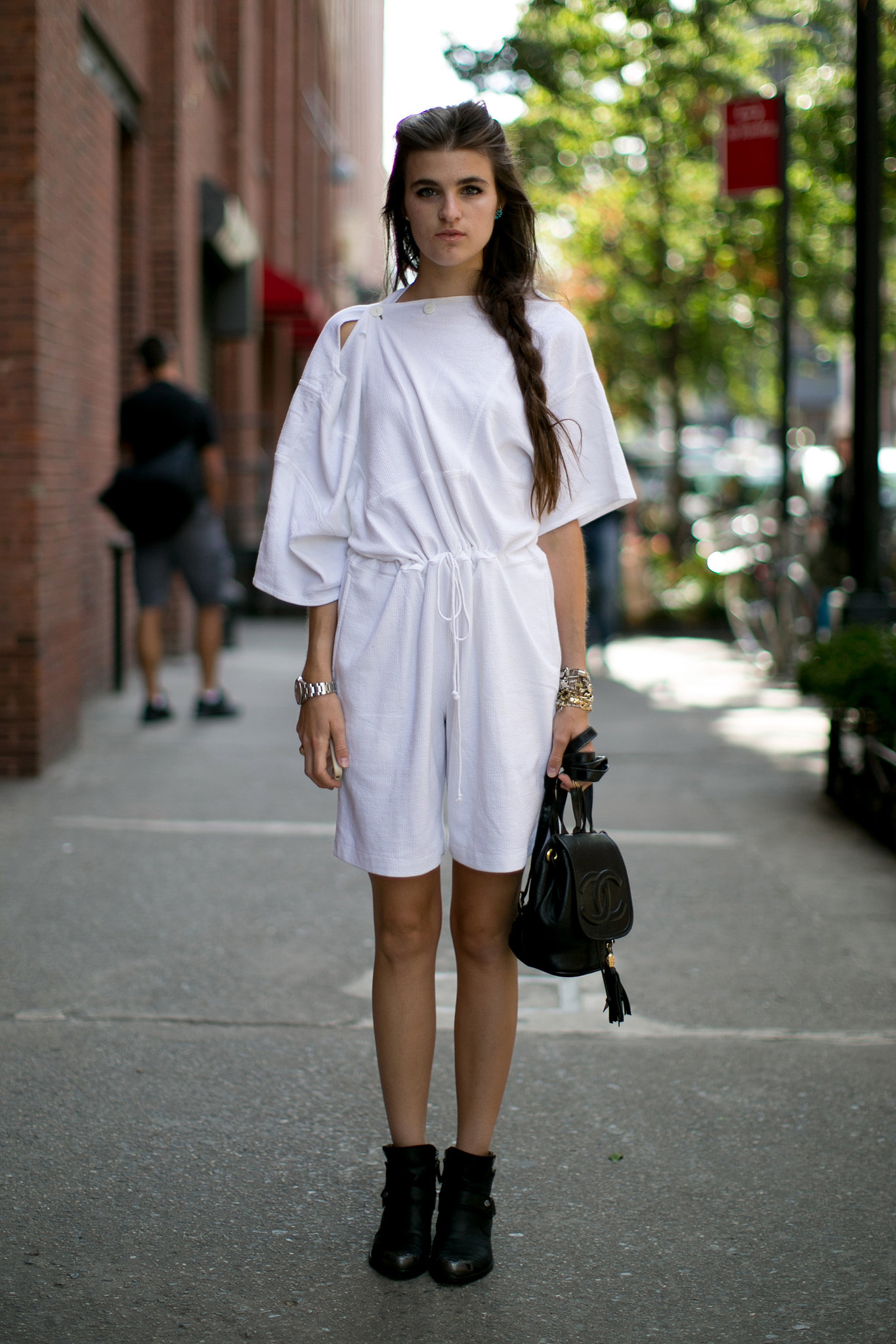 A little white dress — and a little Chanel bag in tow. 
