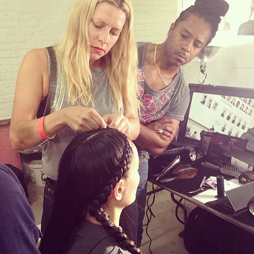 Lead hairstylist Esther Langham took a moment to give her team a braiding tutorial before the Kenneth Cole show.
Lead hairstylist Esther Langham took a moment to give her team a braiding tutorial before the Kenneth Cole show.