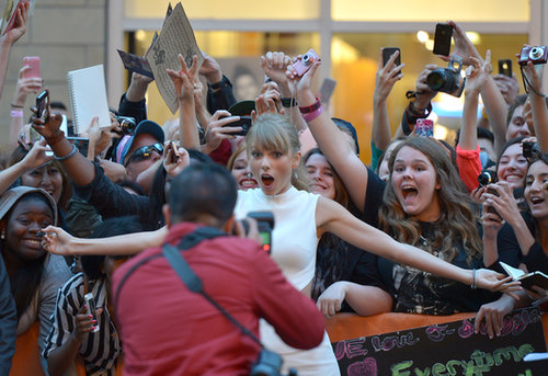 Taylor Swift posed with excited fans at the One Chance premiere.
Taylor Swift posed with excited fans at the One Chance premiere.
