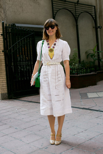 This showgoer dressed up a pretty white dress with bright add-ons.
This showgoer dressed up a pretty white dress with bright add-ons.