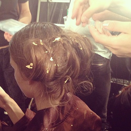 To mimic the appearance of fairy dust, every model got a dash of gold foil in the hair at Lela Rose.
To mimic the appearance of fairy dust, every model got a dash of gold foil in the hair at Lela Rose.