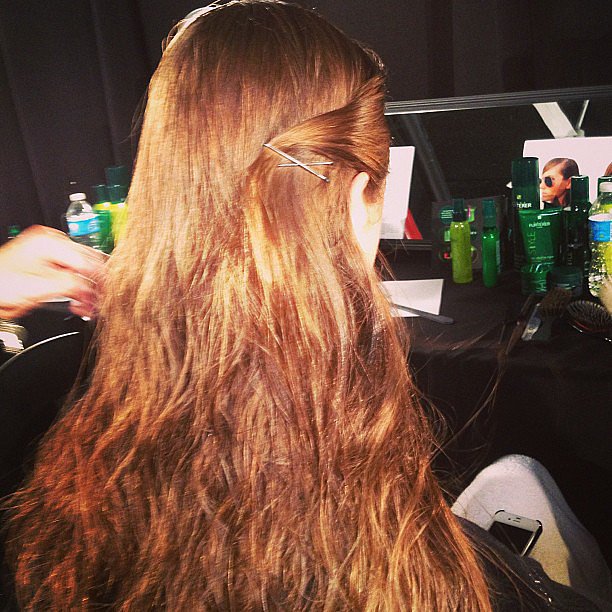 The Band of Outsiders beauty look featured a sultry swoop secured with two bobby pins.
The Band of Outsiders beauty look featured a sultry swoop secured with two bobby pins.