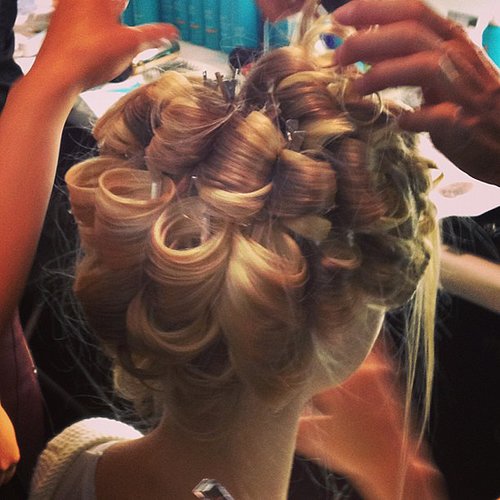 Want to know how to keep your curls bouncy all night? Pin curls, like the ones spotted backstage at Badgley Mischka.
Want to know how to keep your curls bouncy all night? Pin curls, like the ones spotted backstage at Badgley Mischka.
