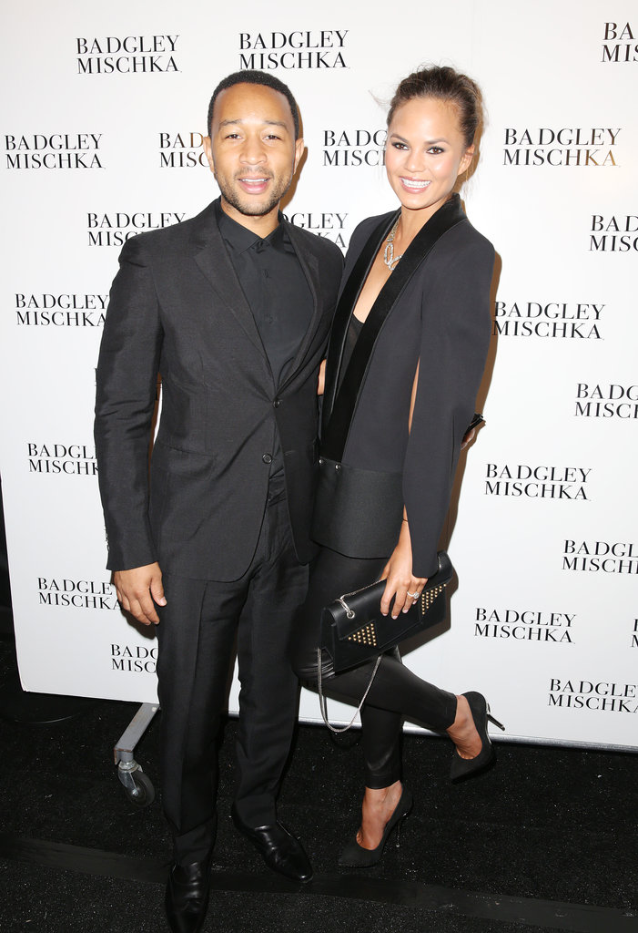John Legend and Chrissy Teigen coordinated in black tuxedos at the Badgley Mischka show.
John Legend and Chrissy Teigen coordinated in black tuxedos at the Badgley Mischka show.