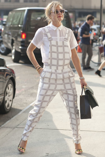 A Topshop jumpsuit got layered up with a smart button-down.
A Topshop jumpsuit got layered up with a smart button-down.