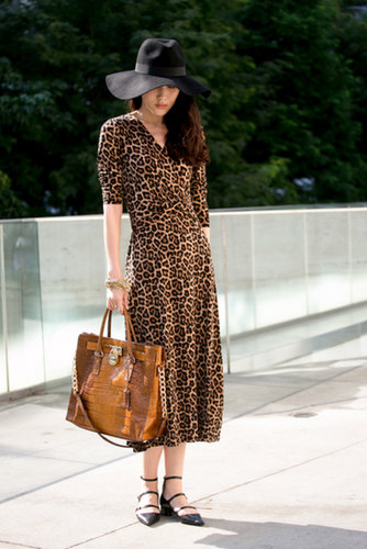 She pared down a lot of leopard with buckled flats.
She pared down a lot of leopard with buckled flats.
