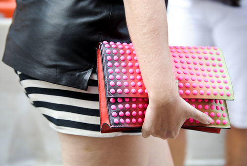 Clutches seemed to be the carryall of choice — this one came brighter than most.
Clutches seemed to be the carryall of choice — this one came brighter than most.
