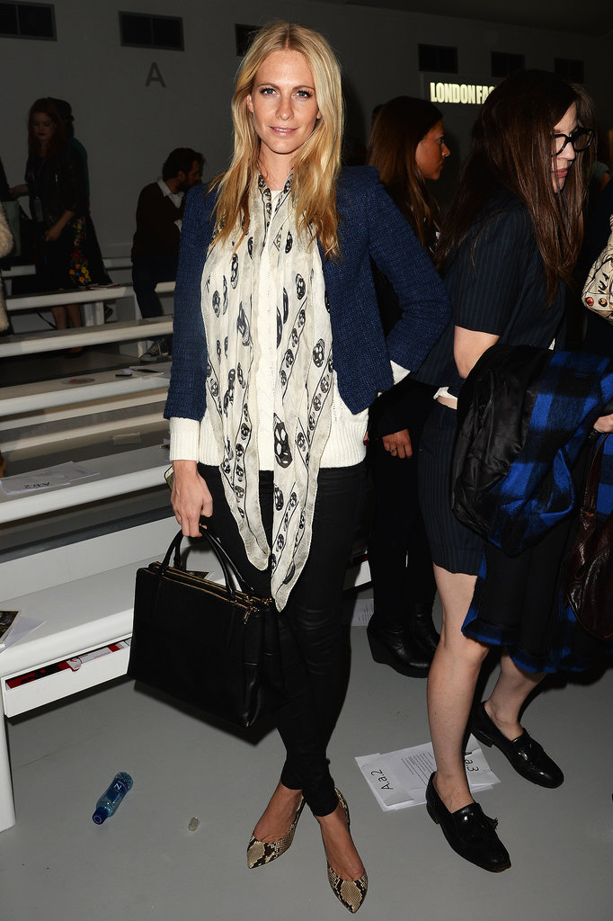Poppy Delevingne accessorized with an outfit-making scarf while at Simone Rocha's runway show.
Poppy Delevingne accessorized with an outfit-making scarf while at Simone Rocha's runway show.
