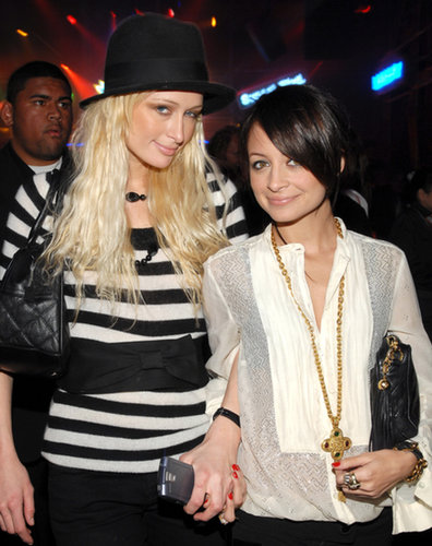 A dark-haired Nicole Richie stuck close to her pal Paris Hilton during an LA soirée in November 2006.
A dark-haired Nicole Richie stuck close to her pal Paris Hilton during an LA soirée in November 2006.