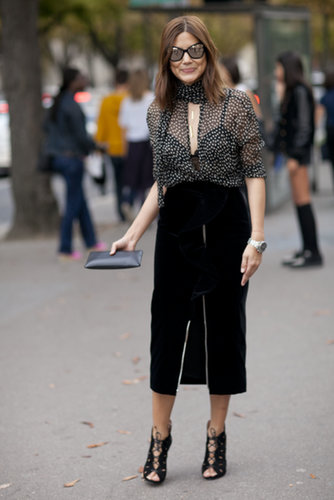 Christine Centenera perfected the art of sophisticated Fashion Week dressing in a sleek skirt, a little sheer, and just the right accessories.
Christine Centenera perfected the art of sophisticated Fashion Week dressing in a sleek skirt, a little sheer, and just the right accessories.