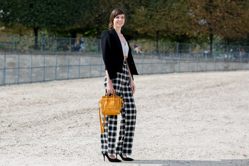 One way to make a black and white look pop: a bright pop of color on your arm candy.
One way to make a black and white look pop: a bright pop of color on your arm candy.