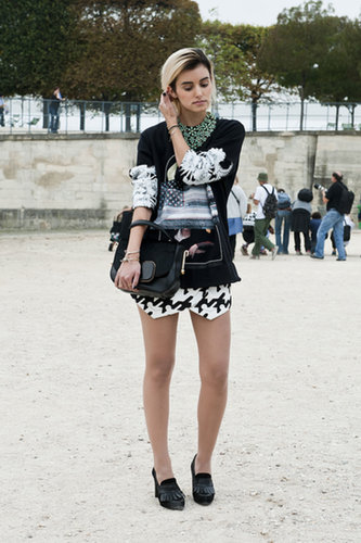 She worked a bold print mix and an even bolder necklace.
She worked a bold print mix and an even bolder necklace.