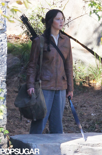 Jennifer Lawrence wielded a bow and arrows while on set in Georgia.
Jennifer Lawrence wielded a bow and arrows while on set in Georgia.