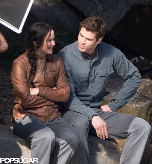 Jennifer Lawrence smirked on set with Liam Hemsworth.
Jennifer Lawrence smirked on set with Liam Hemsworth.
