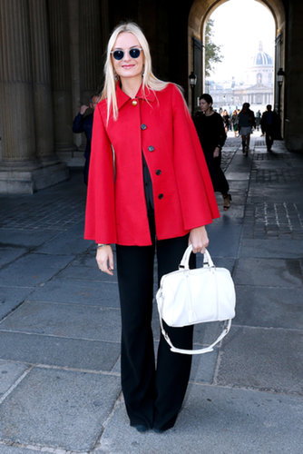 Virginie Courtin Clarins brightened up her dark ensemble with a pop of red cape outside the Louis Vuitton show.
Virginie Courtin Clarins brightened up her dark ensemble with a pop of red cape outside the Louis Vuitton show.